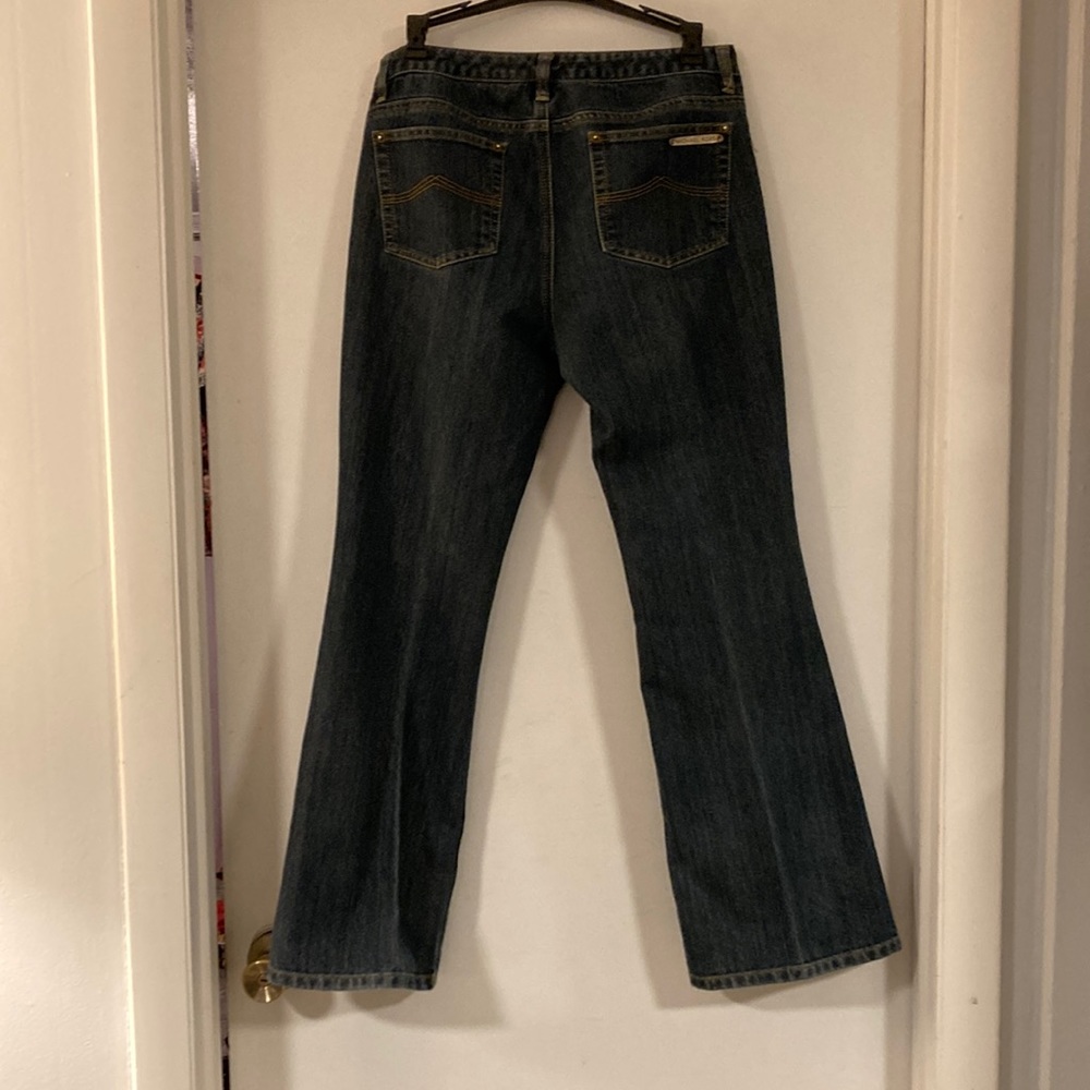 Michael Kors size 8 women’s jeans. Boot cut. Excellent condition.